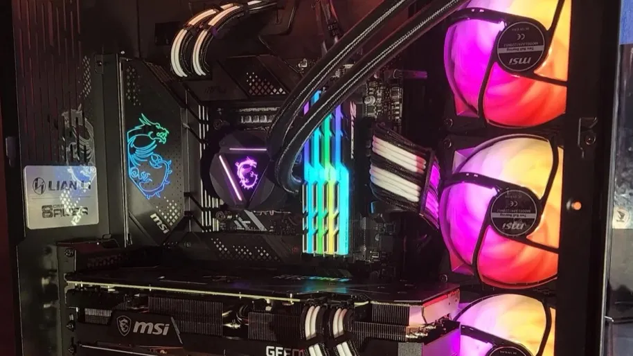 Interior of a completed black Bottomline Thermals gaming PC with RGB lighting
